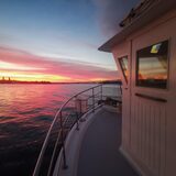 Sunset on Auckland harbour from the boat